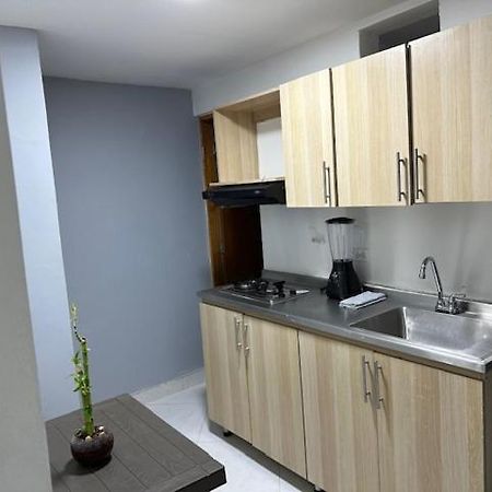Apartahotel Malaga Medellin Bagian luar foto