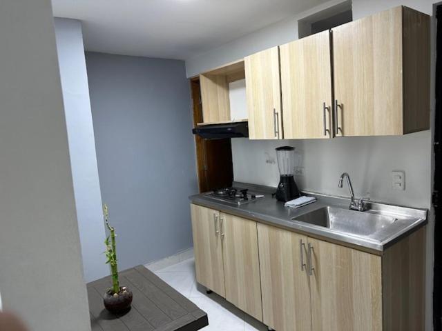 Apartahotel Malaga Medellin Bagian luar foto